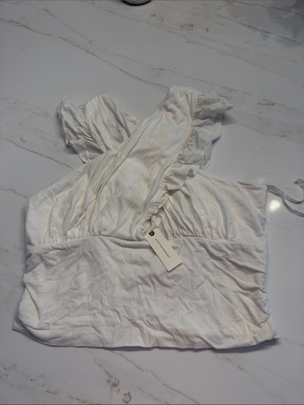 NWT Anthropologie Women's White Ruffle Crop Top with Keyhole Back.